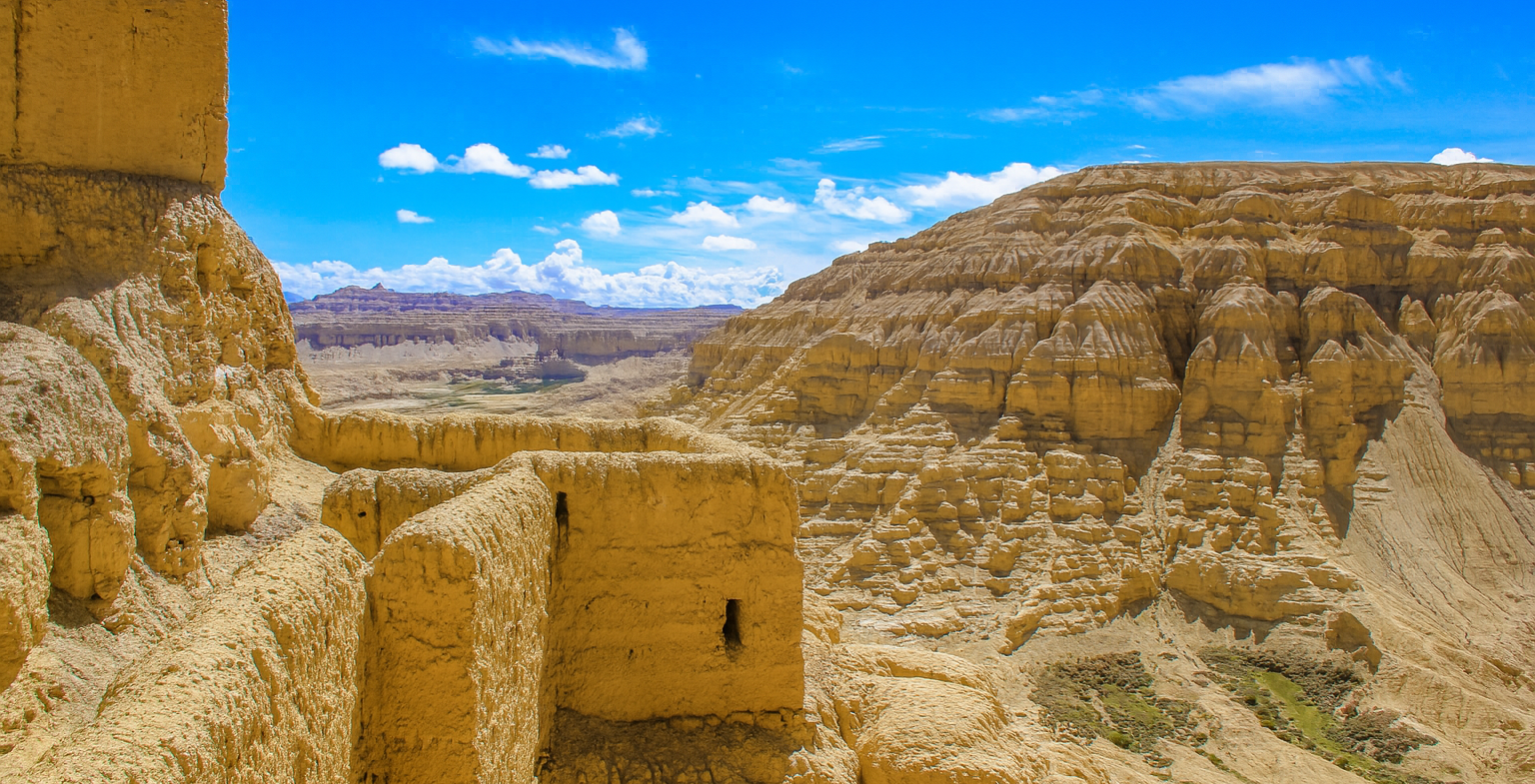 Ancient Guge Kingdom ruins set against desert landscape in western Tibet