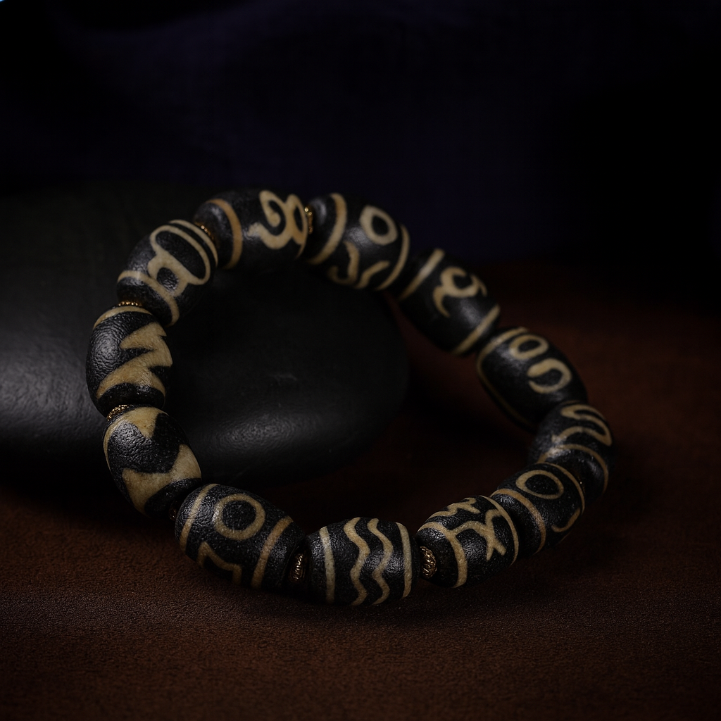 Authentic Dzi bead bracelet featuring sacred eye patterns believed to attract prosperity and positive energy