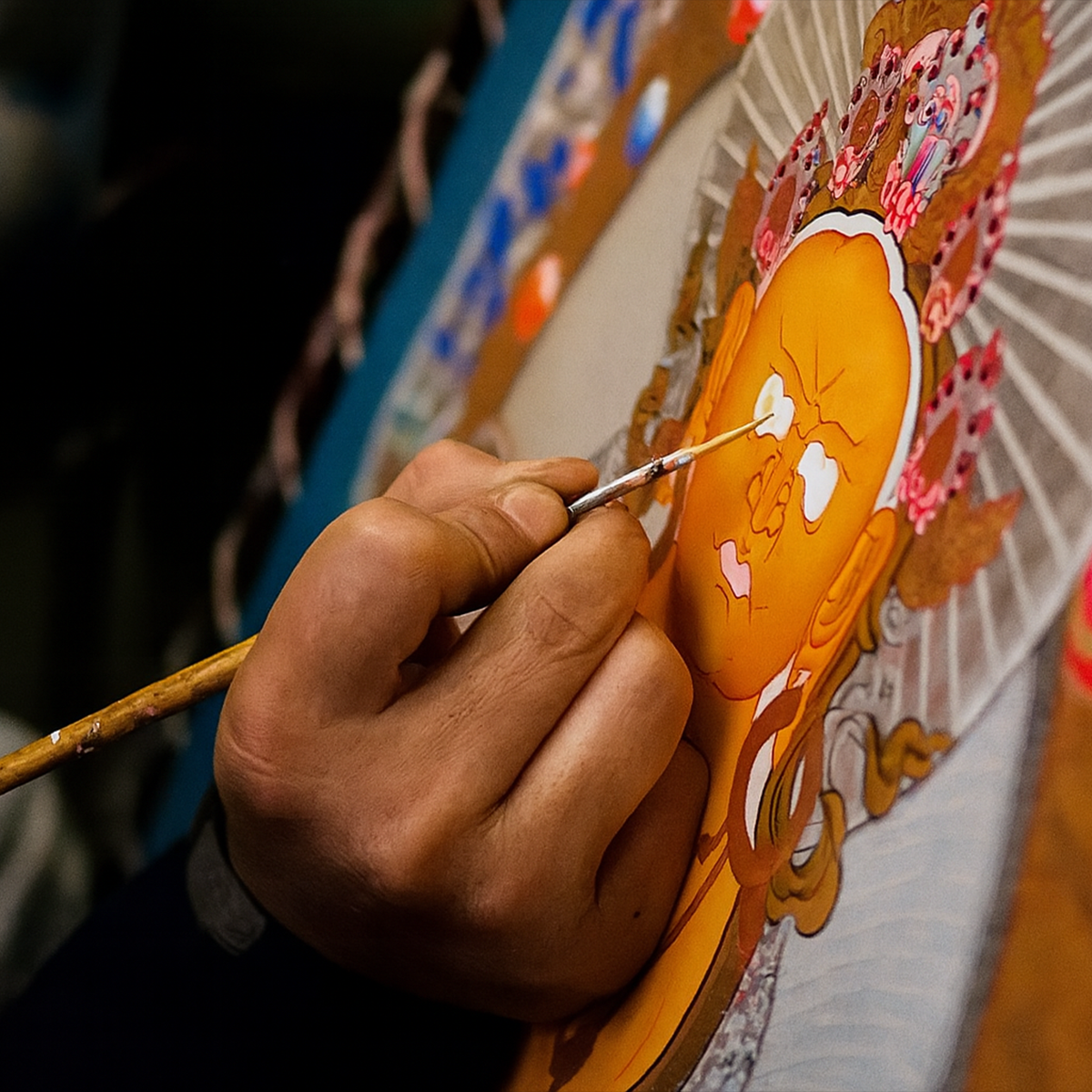 Front view of the Zajiram Thangka pendant on chain highlighting intricate Tibetan painting and spiritual motif