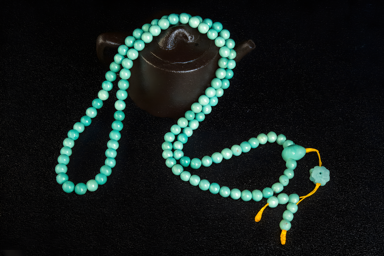 Himalayan turquoise gemstone close-up with light reflecting natural mineral characteristics