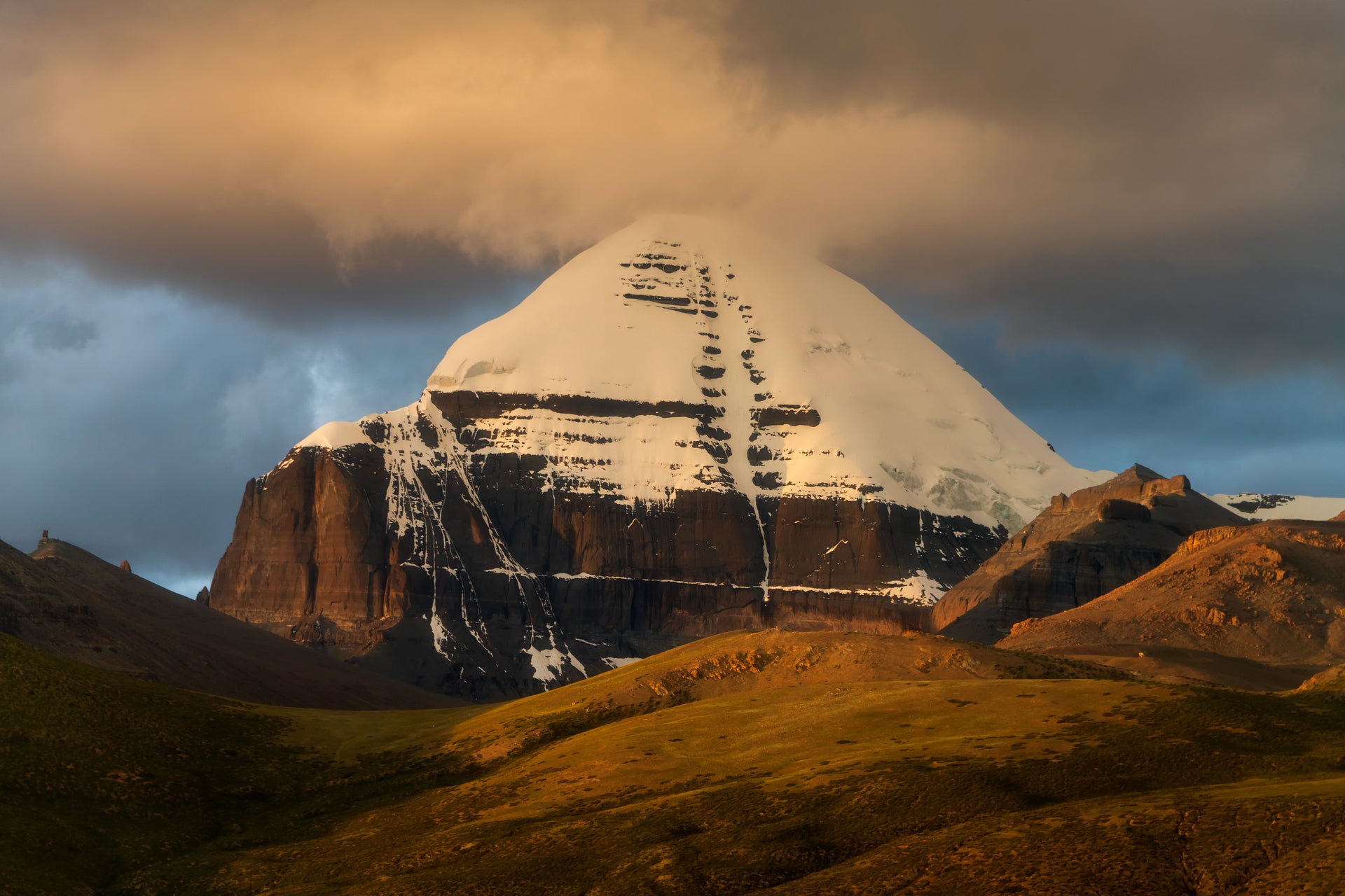 Mount Kailash peak partially veiled in clouds in western Tibet