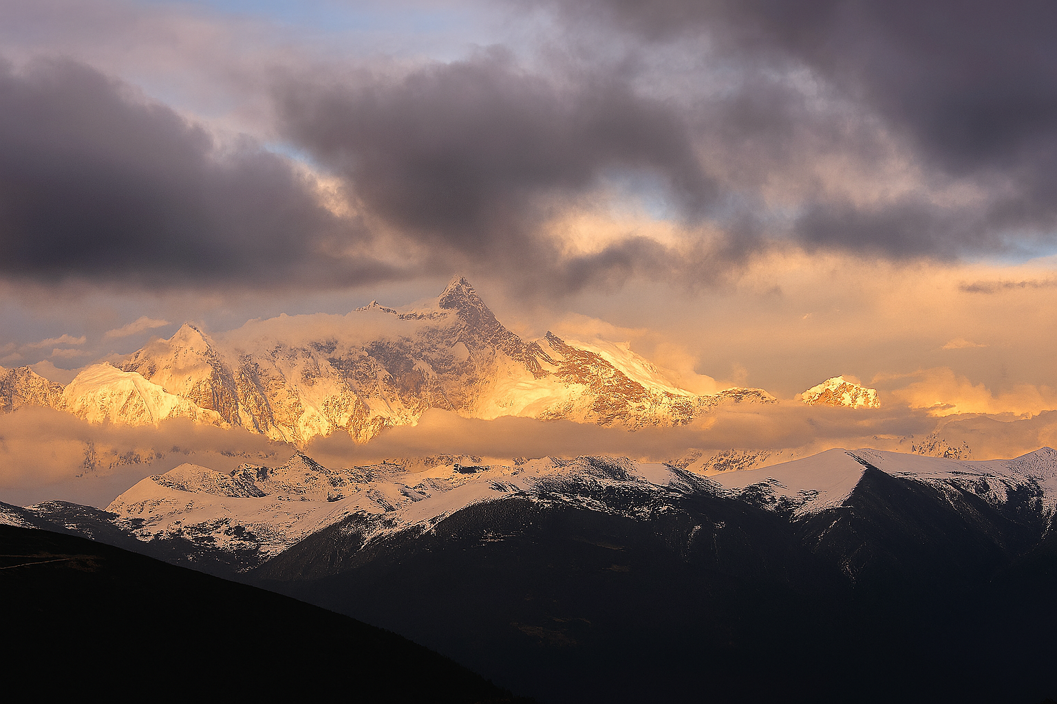 Sunlight illuminating Mount Namcha Barwa in Tibet