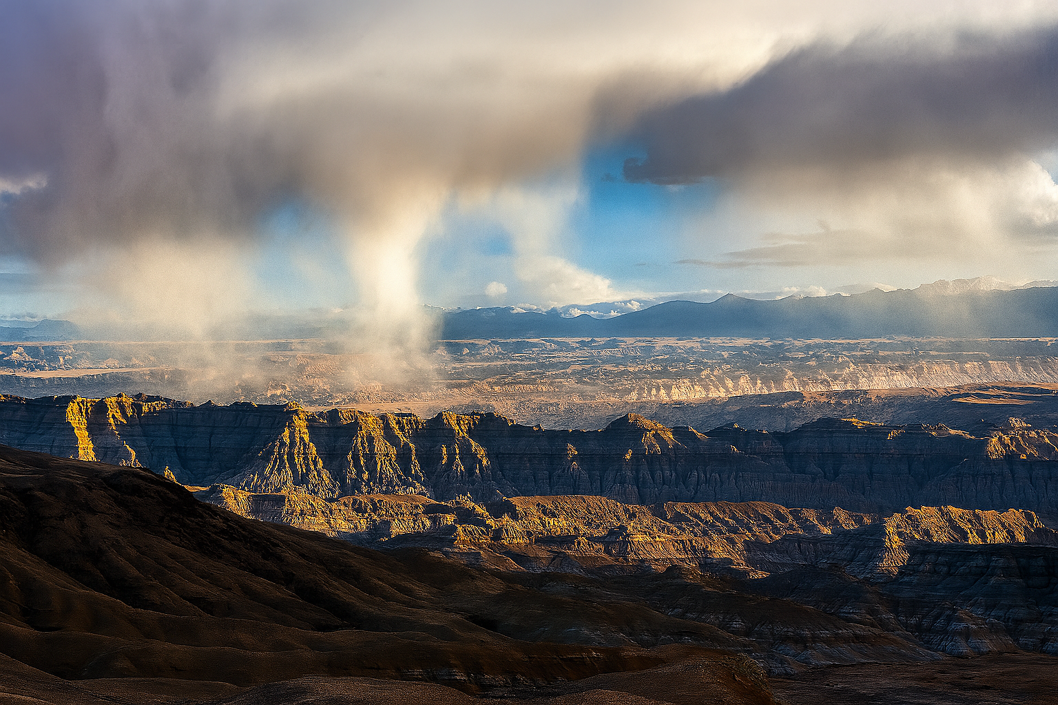 Sunlight illuminating clay formations in the Zhada Earth Forest