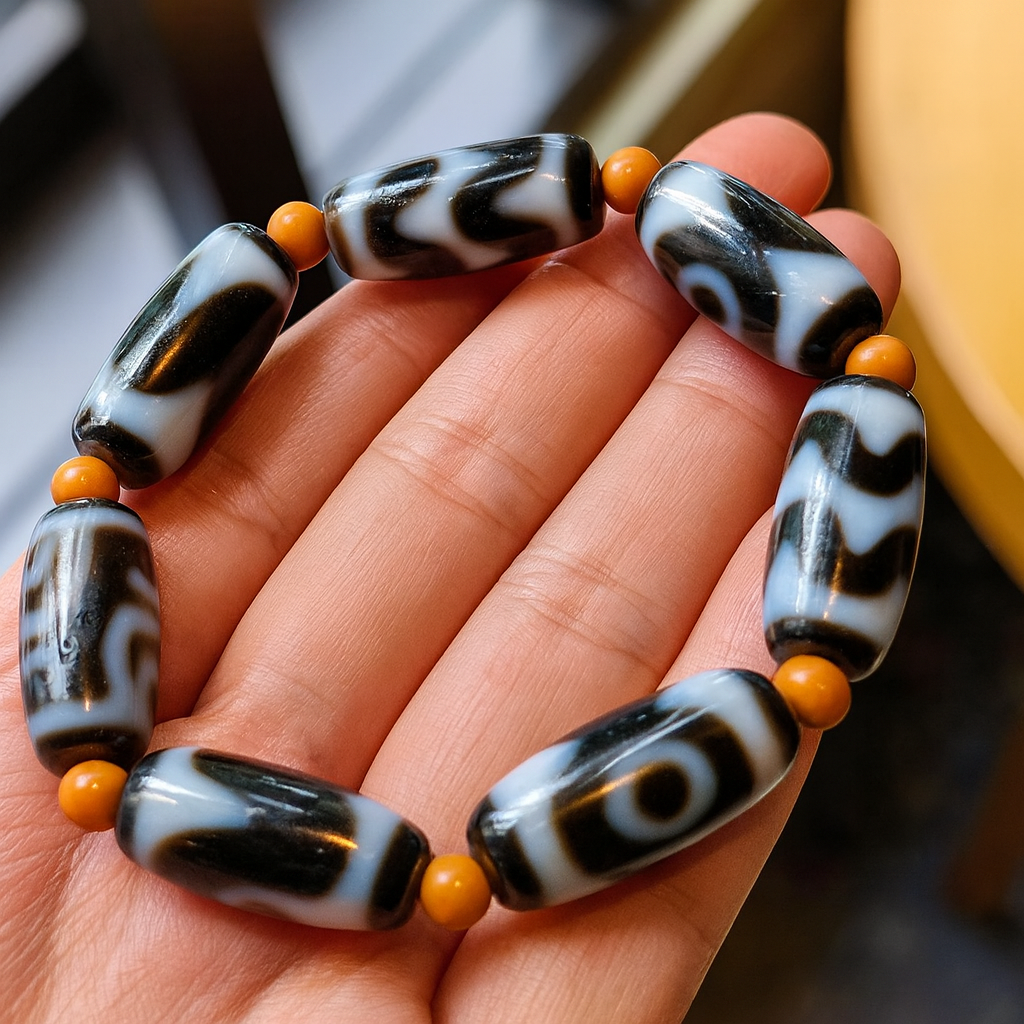 Traditional Tibetan Dzi bracelets collection displayed as protective energy jewelry rooted in Himalayan culture