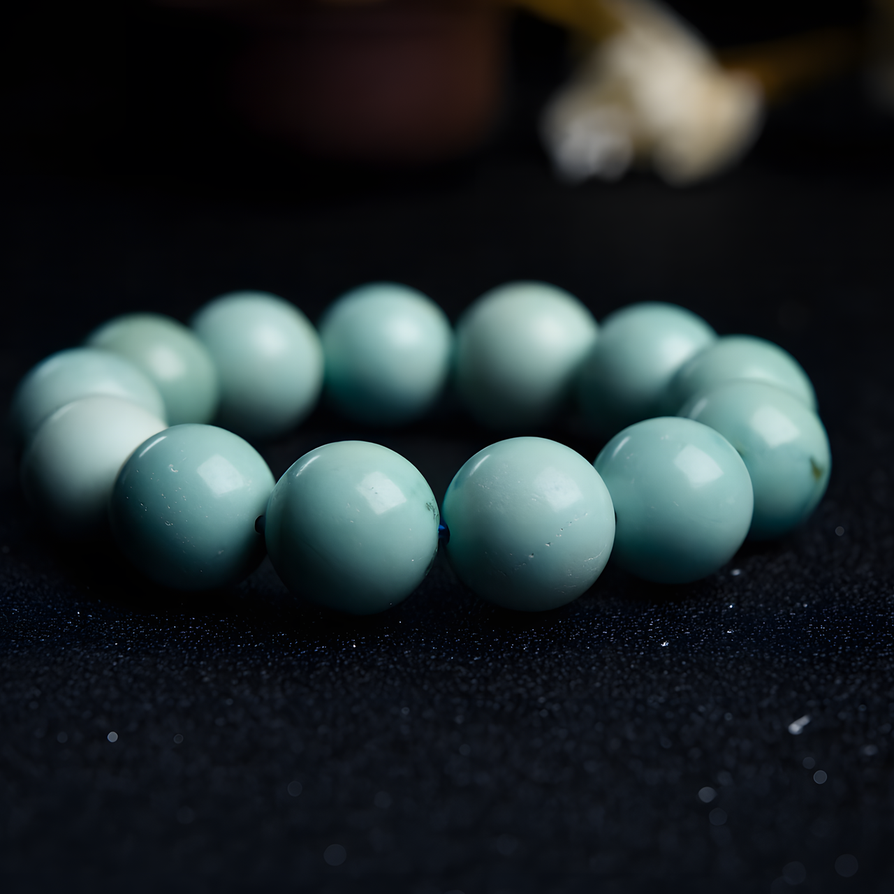 Turquoise beaded bracelet on a dark background