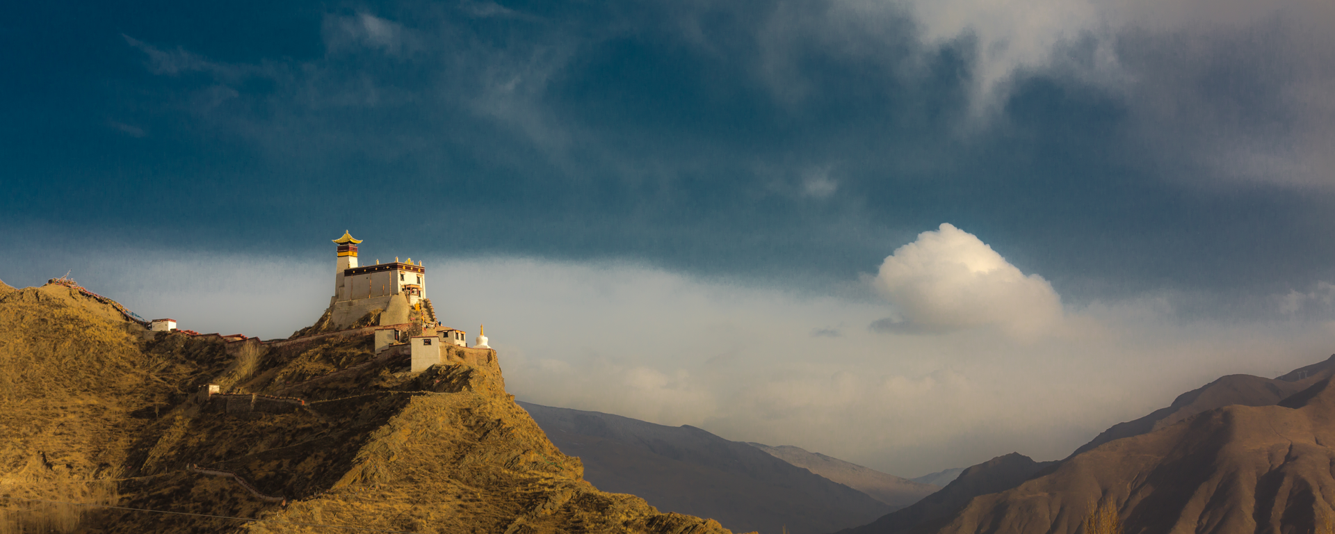 Yumbu Lhakhang historic palace rising atop a hill in southern Tibet
