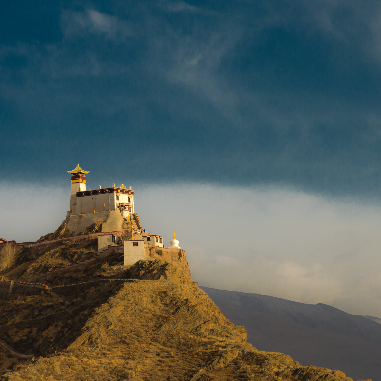Yumbu Lhakhang historic palace rising atop a hill in southern Tibet